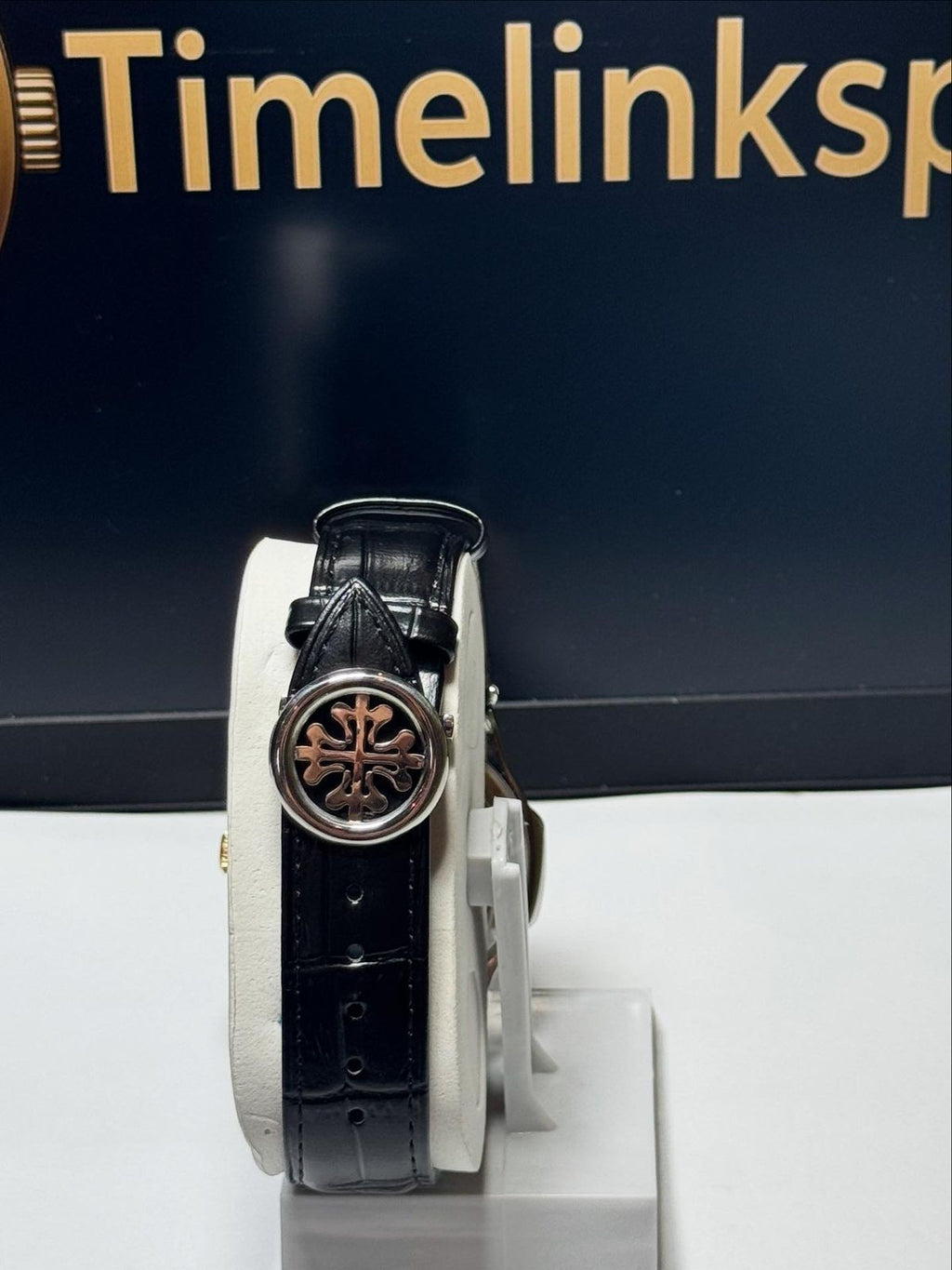 Patek phillipe with strap and master lock with logo